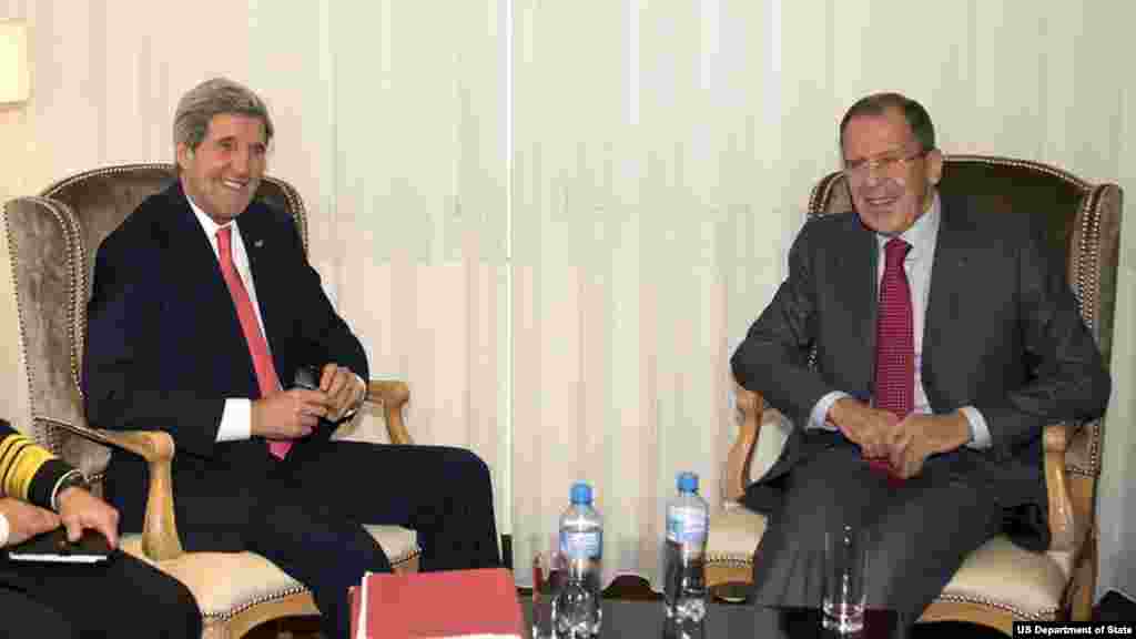 U.S. Secretary of State John Kerry meets with Russian Foreign Minister Sergey Lavrov on the margins of talks focused on Iran's nuclear capabilities, Geneva, Switzerland, November 23, 2013.