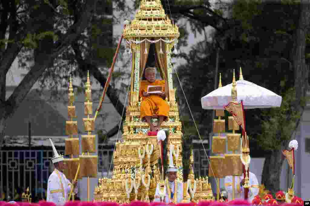Supreme Patriarch is transported in a royal chariot during the funeral procession of Thailand's late King Bhumibol Adulyadej in Bangkok, Thailand, Oct. 26, 2017.