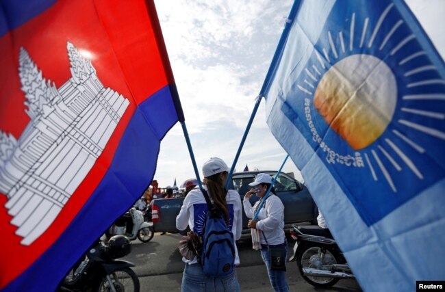 Supporters of the Cambodia National Rescue Party (CNRP) gather during a local election campaign in Phnom Penh, Cambodia May 20, 2017.