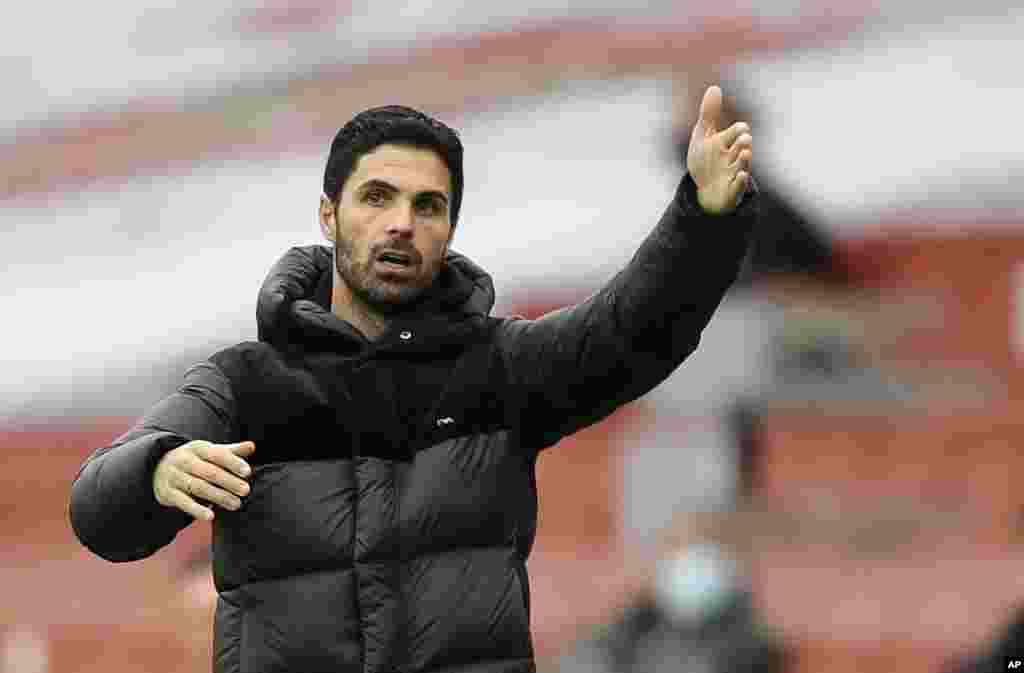 Mikel Arteta, Arsenal - Manager Arsenal manager Mikel Arteta tested positive for COVID-19 on March 12, according to a statement on the club&#39;s official website. He completed his recovery and returned to work with the Premier League side. Photo: Arsenal&#39;s manager Mikel Arteta gestures from the side lines to his players during the English Premier League soccer match between Arsenal and Sheffield United at the Emirates Stadium in London, Sunday, Oct. 4, 2020. (AP Photo/Kirsty Wigglesworth)