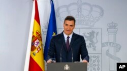 FILE - Spain's Prime Minister Pedro Sanchez delivers a statement at the Moncloa Palace in Madrid, Spain, Feb. 15, 2019. (AP Photo/Andrea Comas)