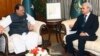 In this photo released by the Pakistan Press Information Department, President of Pakistan Mamnoon Hussain, left, talks with new Care Taker Prime Minister Nasir-ul-Mulk in Islamabad, June 1, 2018. 