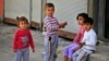 FILE - Syrian refugee children pass time in a neighborhood of the city of Gaziantep, southeastern Turkey on May 16, 2016. (AP)