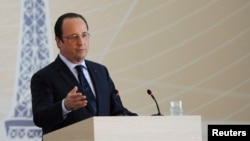 French President Francois Hollande delivers a speech during his visit to Baku, Azerbaijan, May 11, 2014.