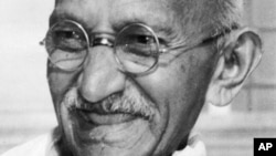 Indian leader Mohandas K. Gandhi, also known as Mahatma Gandhi, smiles in this 1947 file photo, location unknown.