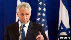 U.S. Defense Secretary Chuck Hagel speaks during a joint news conference with his Israeli counterpart Moshe Yaalon (not pictured) at the Kirya base in Tel Aviv, April 22, 2013. 