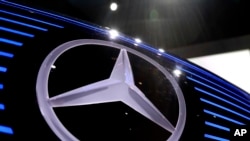 FILE- The logo of Mercedes is photographed at the annual news conference at the company's headquarters in Stuttgart, Germany. 