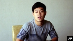 FILE - Joo Won-moon, a South Korean student at New York University, is interviewed at the Koryo Hotel in Pyongyang, North Korea, July 14, 2015