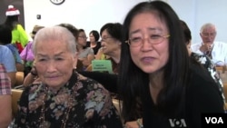 Ching Fen Wang, 95, and her daughter at a Senior Center talent show in Los Angeles.