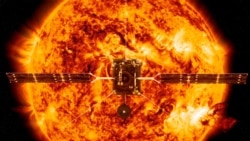 This illustration made available by NASA depicts the Solar Orbiter satellite in front of the Sun. European Space Agency have planned to launch the spacecraft on a mission to the sun to get close-up views of its polar regions. (ESA/ATG medialab, NASA/SDO/