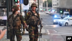 Belgian Army soldiers patrol outside Central Station after a reported explosion in Brussels, June 20, 2017. 