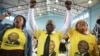 Supporters cheer South African President Cyril Ramaphosa during an election rally for ruling African National Congress (ANC) ahead of the May 8th general election, in Mitchells Plain near Cape Town, South Africa, May 3, 2019. 