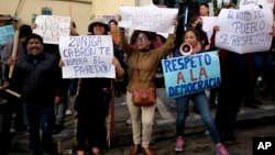 Supporters of Bolivian President Luis Arce demonstrate outside the prosecutor's office demanding jail time for former army chief Juan Jose Zuniga in La Paz, Bolivia, on June 28, 2024, two days after troops stormed the government palace.