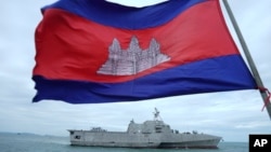 A Cambodian flag flutters as USS Savannah arrives for a port call at Sihanoukville port, Cambodia, Dec. 16, 2024.