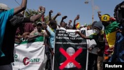 FILE — Senegalese civil society groups hold protest over delayed presidential election, in DakarSenegal February 17, 2024.