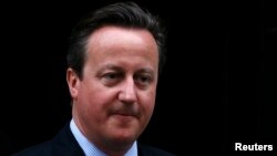 Britain's Prime Minister David Cameron leaves No. 10 Downing Street in London, Britain, April 11, 2016. 