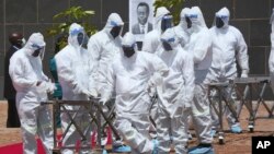 Bamelele ukungcwaba obeyisiphathamandla sikahulumende, Harare, Thursday, Jan. 21, 2021.