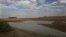 FILE - Taps and water sources are dry in South Africa's almost depleted local dam in Senekal, Jan. 7, 2016. Senekal, a small town in South Africa’s rural Free State province, is one of four regions declared disaster areas as drought dries up the country's heartland.