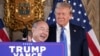 SoftBank Group CEO Masayoshi Son smiles with President-elect Donald Trump during a news conference at Mar-a-Lago, in Palm Beach, Florida, Dec. 16, 2024. 