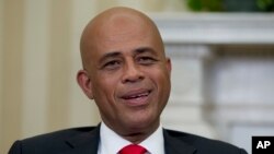 Presiden Haiti Michel Martelly dalam kunjungan ke Gedung Putih, Februari 2014.