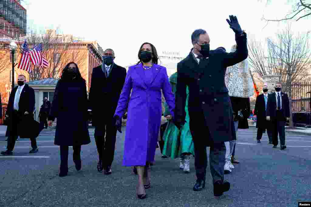 U.S. Vice President Kamala Harris and her husband Douglas Emhoff walk during the Inauguration Day parade for U.S. President Joe Biden, in Washington, January 20, 2021. 