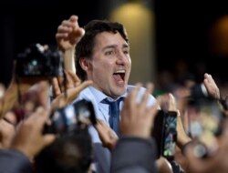 Leader of the Liberal Party of Canada, Prime Minister Justin Trudeau, speaks to his supporters during a "Team Trudeau 2019" Rally at the Woodward’s Atrium in Vancouver, British Columbia, Oct. 20, 2019.