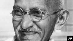 Indian leader Mohandas K. Gandhi, also known as Mahatma Gandhi, smiles in this 1947 file photo, location unknown.