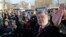 Ukraine's President Petro Poroshenko speaks with people after a wreath laying ceremony at the monument to the fallen Heroes of the "Heavenly Sotnya" (Hundred) in Kiev, Ukraine, Nov. 21, 2014.