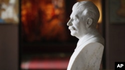 A bust of Soviet dictator Josef Stalin sits inside a museum dedicated to him in the town of Gori, some 80 kilometers west of the Georgian capital Tbilisi, April 9, 2012.