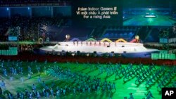 FILE - Martial arts performers are seen during the opening ceremony of the Third Asian Indoor Games at My Dinh National Stadium in Hanoi, Vietnam, Oct. 30, 2009. 