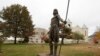 FILE - A statue stands on campus at Haskell Indian Nations University on Oct. 23, 2009, in Lawrence, Kansas. 