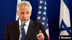 U.S. Defense Secretary Chuck Hagel speaks during a joint news conference with his Israeli counterpart Moshe Yaalon (not pictured) at the Kirya base in Tel Aviv, April 22, 2013. 