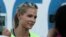 Russia's long jumper Darya Klishina speaks at the National track and field championships at a stadium in Cheboksary, Russia, Monday, June 20, 2016. 
