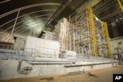A view inside the "new safe confinement" shelter that spans the remains of the Chernobyl nuclear power plant's Reactor No. 4, in Chernobyl, Ukraine, July 10, 2019.