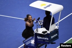 Serena Williams of the United States yells at chair umpire Carlos Ramos in the women's final against Naomi Osaka of Japan at the 2018 U.S. Open tennis tournament in New York, Sept. 8, 2018. (D. Parhizkaran/USA Today)