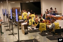 Election staff count ballots in Tirana, Albania, June 26, 2017. Albania's left-wing Socialist Party appears headed for a new governing mandate.