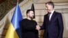 Ukraine's President Volodymyr Zelenskyy, left, shakes hands with Belgium's Prime Minister Alexander De Croo during their meeting at the prime ministers' office in Brussels, May 28, 2024.
