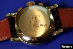 RC, the initials of the first owner and the date of purchase, May 25, 1956, are seen on "The Asprey," a Patek Philippe perpetual calendar chronograph watch reference 2499, during a press preview ahead of the upcoming auction at Sotheby's in Geneva, Nov.