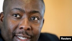 FILE - Zimbabwe's Minister of Youth Development, Indigenization and Empowerment Saviour Kasukuwere speaks during the Reuters Africa Investment Summit in Sandton, April 16, 2012. 