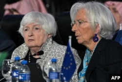 FILE —US Treasury Secretary Janet Yellen (L) and European Central Bank President Christine Lagarde (R) attend the G20 finance ministers meeting in Sao Paulo, Brazil on February 28, 2024.