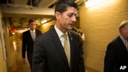 Rep. Paul Ryan, R-Wis. arrives for a House GOP conference meeting on Capitol Hill in Washington, Wednesday, Oct. 21, 2015.