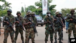 FILE - Ghana's military and police maintained order in 2012 elections. 