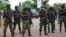 FILE - Ghana's military and police maintained order during the 2012 elections. Hikes in civil service wages during that election caused the deficit to soar.