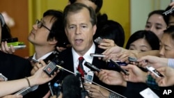 U.S. Special Representative for North Korea Policy Glyn Davies answers reporters' questions after his meeting with his South Korean counterpart Cho Tae-yong, in Seoul, Sept. 10, 2013.