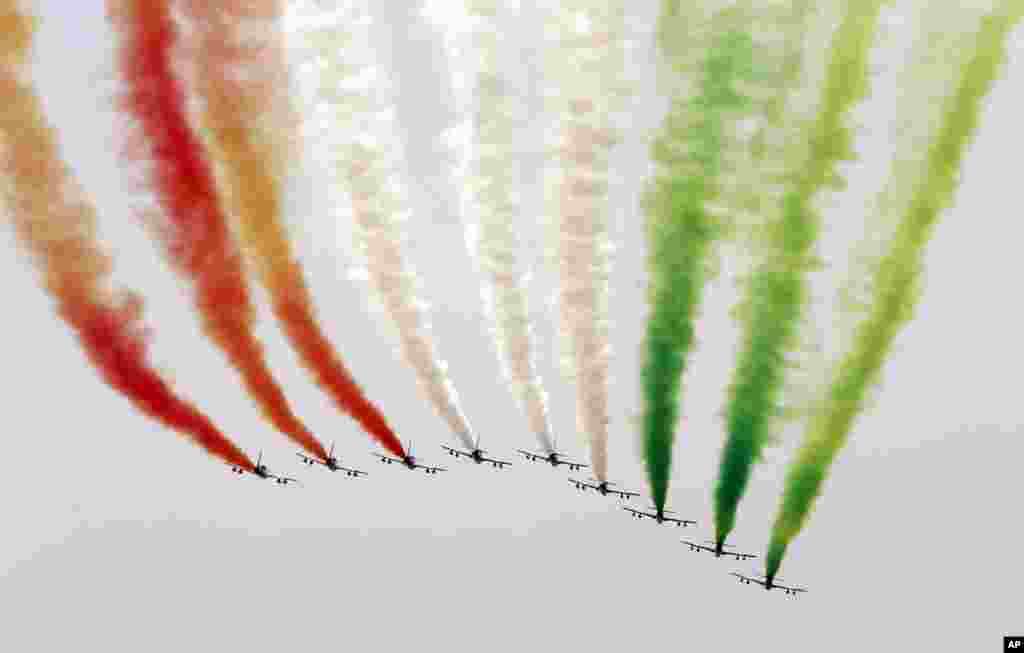 The &#39; Frecce Tricolori &#39; Italian Air Force acrobatic squad team flies over the Monza racetrack prior to the start of the Italian Formula One Grand Prix.