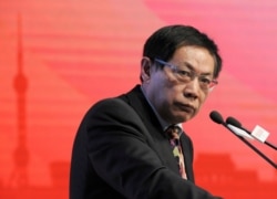 FILE - Ren Zhiqiang, the former chairman of state-owned property developer Huayuan Group, speaks at the China Public Welfare Forum in Beijing, Nov. 18, 2013.