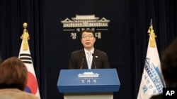 Yoon Young-chan, South Korean President Moon Jae-in's press secretary, speaks during a press briefing at the presidential Blue House in Seoul, March 4, 2018.