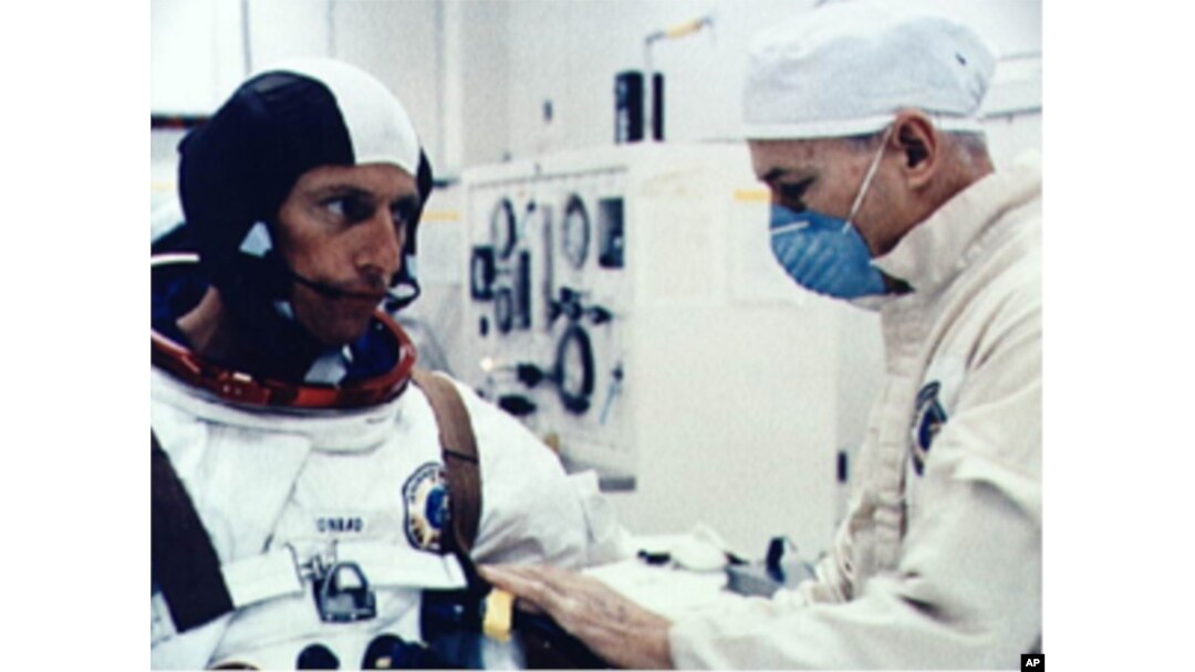 Astronaut Joseph Kerwin suits up.
