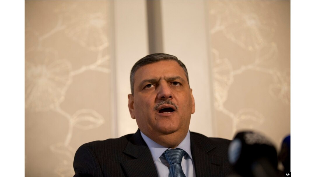Riyad Hijab, head of the Syrian opposition High Negotiations Committee, gives a press conference in London, Feb. 10, 2016. The committee said Hijab thinks the chances of reaching an agreement on a political transition in Syria are “slim.”