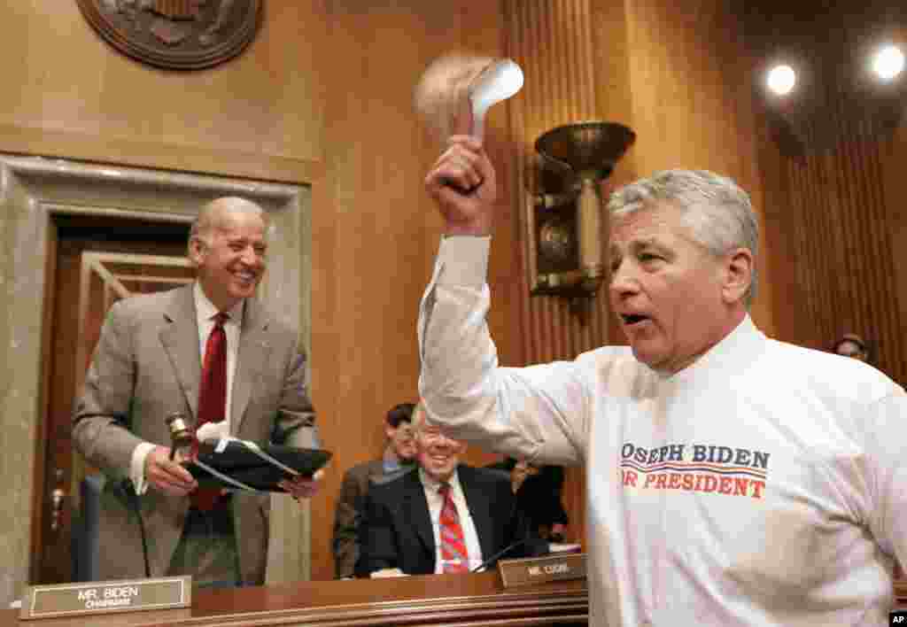 Then Chairman of the Senate Foreign Relations Committee Joe Biden, left, laughs as then Senator Chuck Hagel, dresses up as Biden for Halloween, October 31, 2007, on Capitol Hill.